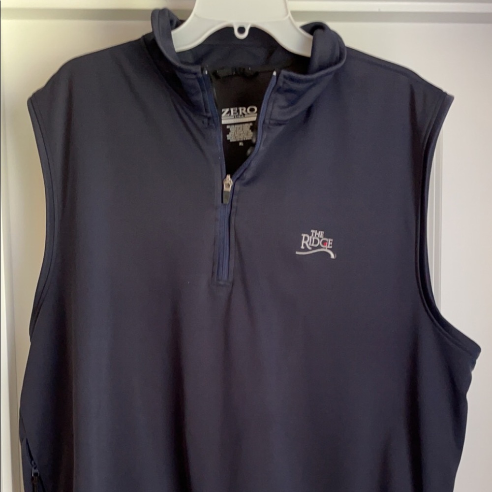 The Ridge golf course quarter zip vest